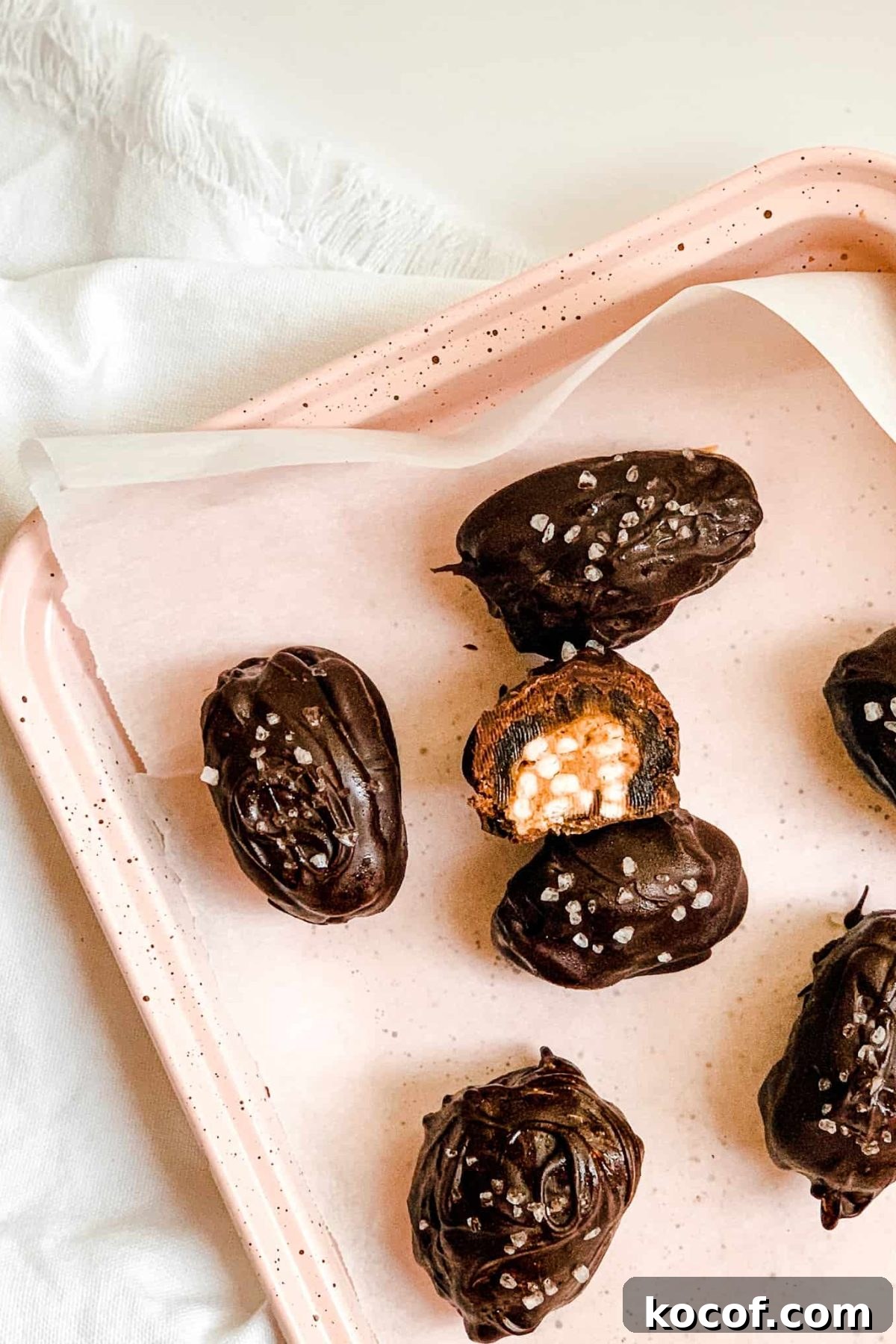 Pink Baking Sheet with Healthy Salted Chocolate Date Candies