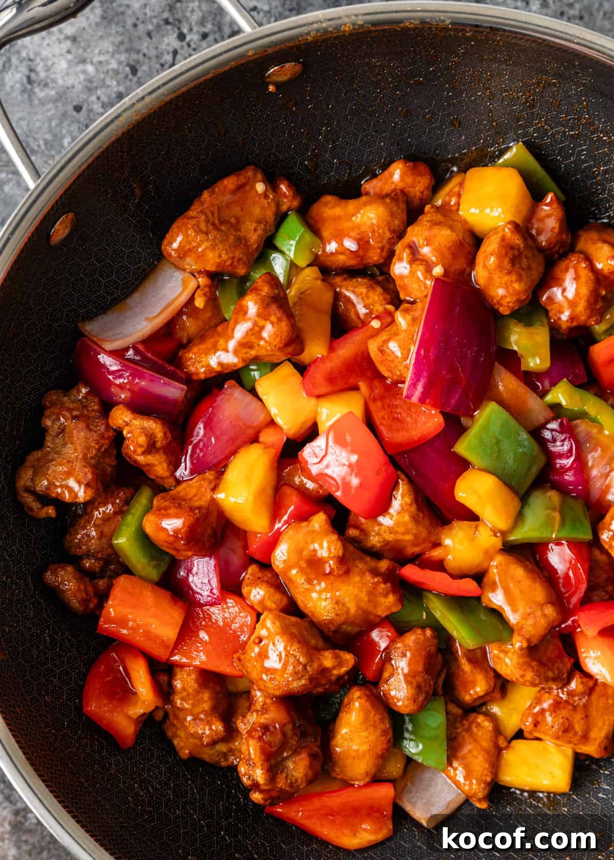 overhead: my sweet and sour pork recipe cooking in a skillet
