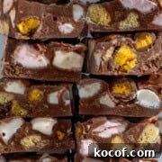 Two stacks of rocky road fudge squares piled up.