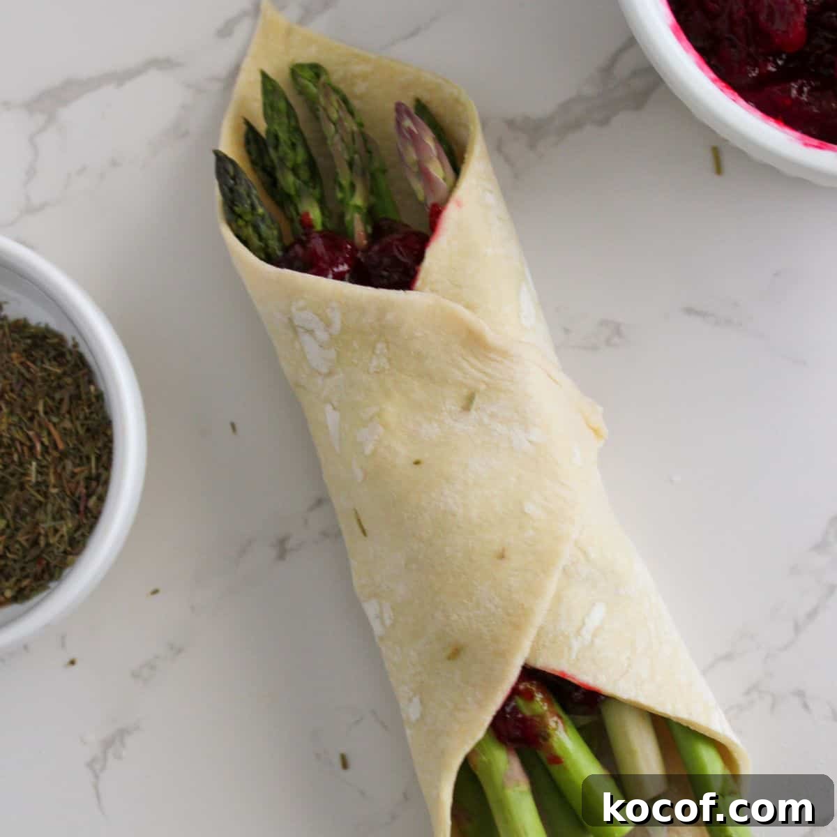 Crispy Puff Pastry-Wrapped Asparagus Recipe 6 Puff pastry wrapped around asparagus.