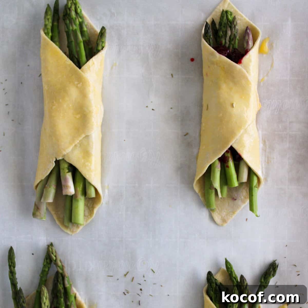 Crispy Puff Pastry-Wrapped Asparagus Recipe 7 Asparagus bundles with egg wash.