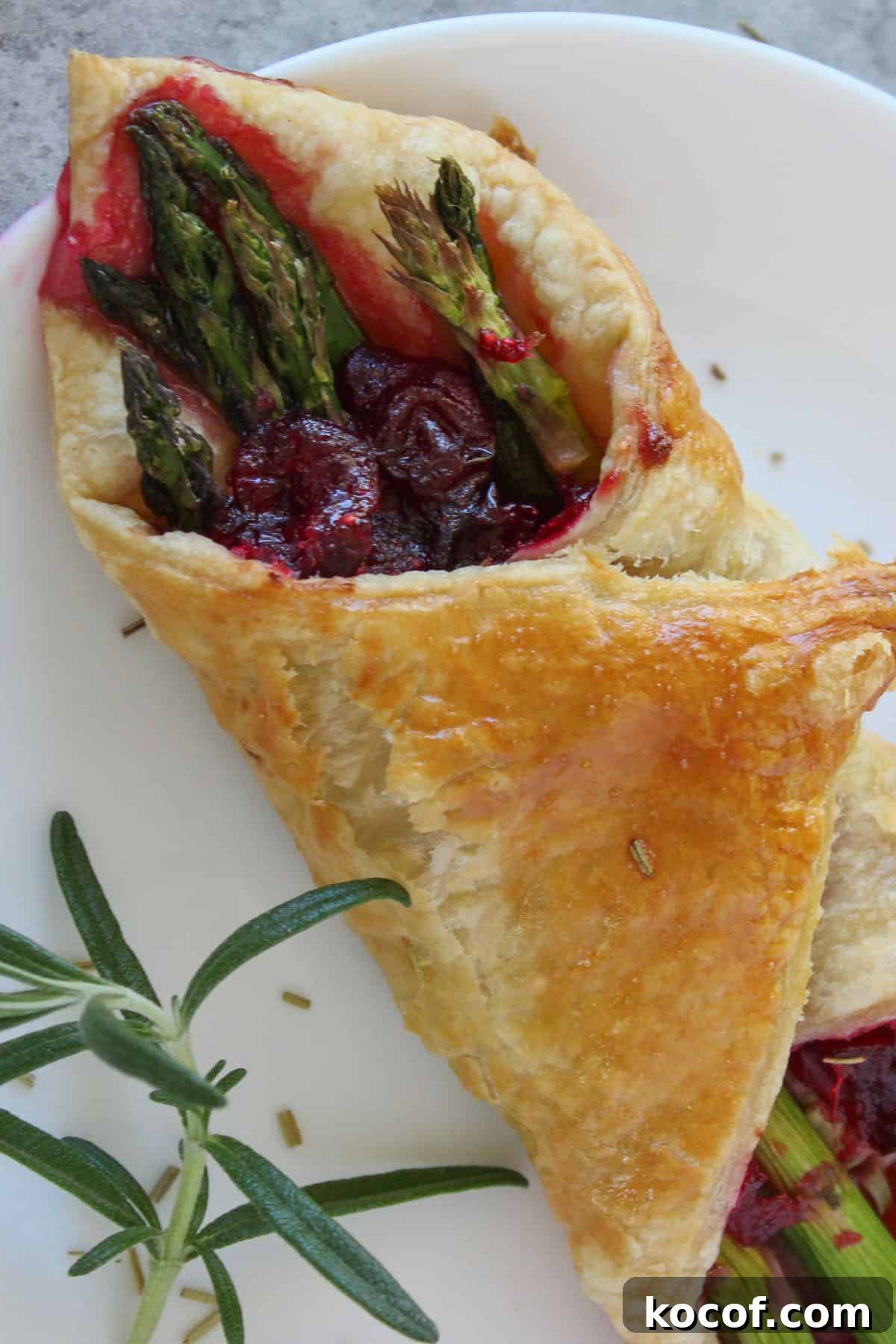 Crispy Puff Pastry-Wrapped Asparagus Recipe 8 Asparagus wrapped in puff pastry with cranberry.
