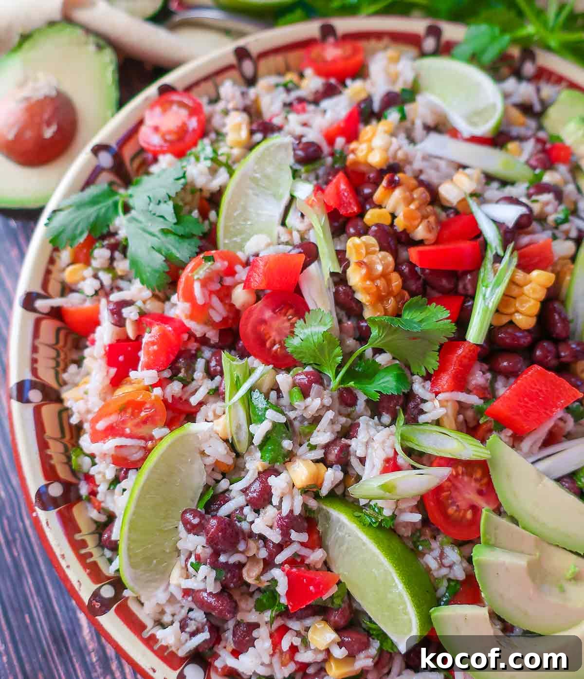 Protein-Packed Ideas for a Gluten-Free Plant-Based Diet 2 Southwest black bean rice salad in bowl with avocado slices
