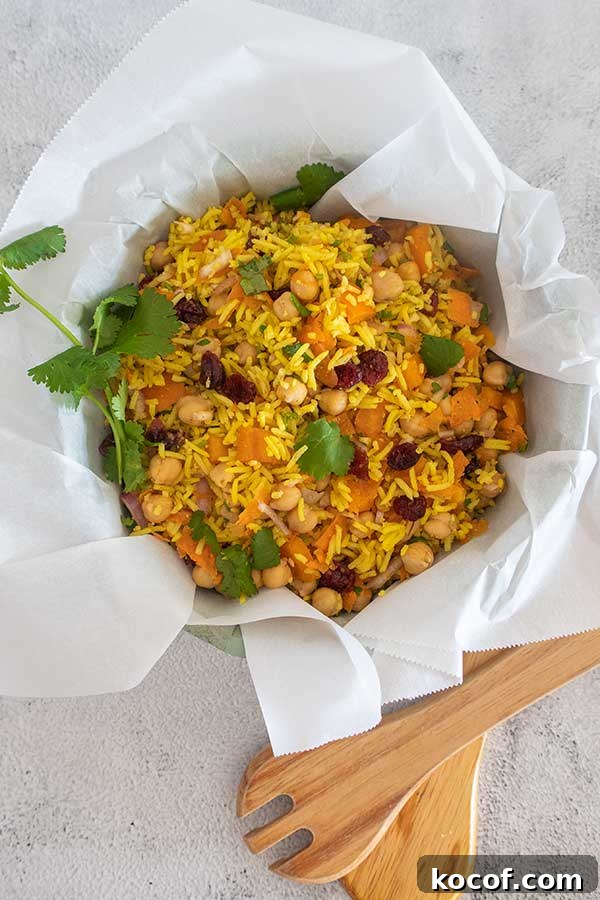 Protein-Packed Ideas for a Gluten-Free Plant-Based Diet 6 moroccan chickpea rice salad in a large salad bowl toped with cilantro