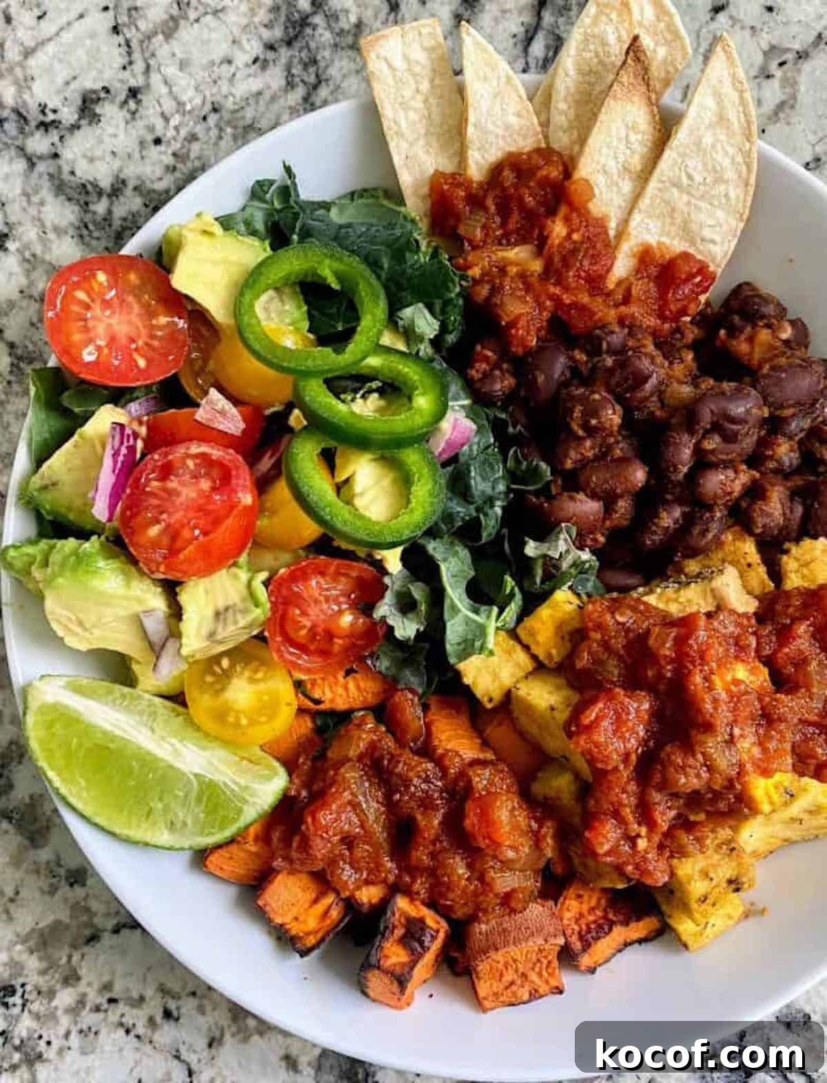 Hearty Vegan Breakfast Bowl with Quinoa, Avocado & Tofu 2 Vegan breakfast bowl closeup.