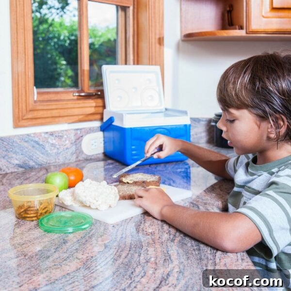 Back-to-School Lunch Ideas and Practical Prep Tips 4 boy helping make lunch at counter
