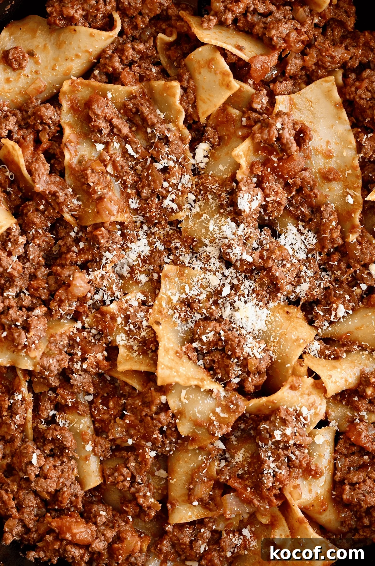 One-Pan Skillet Lasagna Recipe for Quick Weeknight Dinners 10 Pieces of lasagna noodles coated in beef marinara sauce and garnished with grated Parmesan cheese.