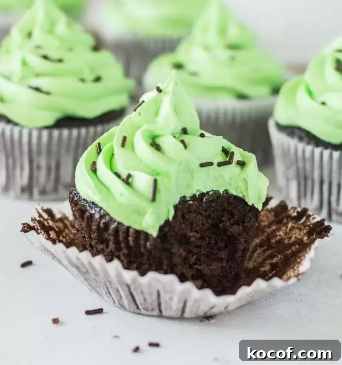 Indulgent Chocolate Mint Cupcakes with Creamy Mint Frosting 5 chocolate mint cupcake with a bite taken out of it