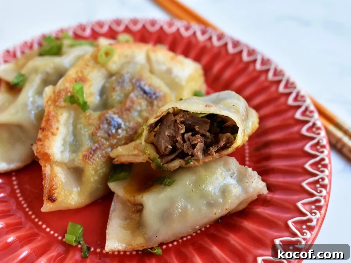 Korean Beef Mandu Dumplings Recipe: Authentic Jew Mandu Guide 15 Inside of a korean beef dumpling close up view.