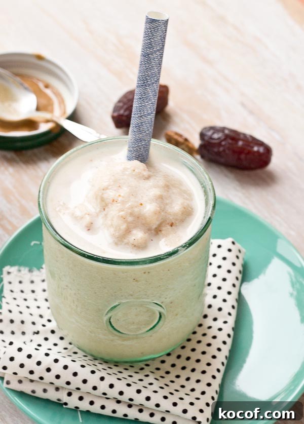This Almond Butter Date Shake is just what you need to help you power through your day! It's creamy and dessert-like and makes a healthy protein rich snack or post workout recovery shake. | @KristinaLaRueRD