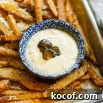 20 Delicious Side Dishes to Serve with Sliders 27 Truffle aioli (garlic truffle mayo) in a bowl with fries.