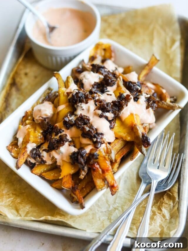 20 Delicious Side Dishes to Serve with Sliders 10 cropped-in-n-out-animal-style-fries-copycat-recipe-the-heirloom-pantry-03.jpg