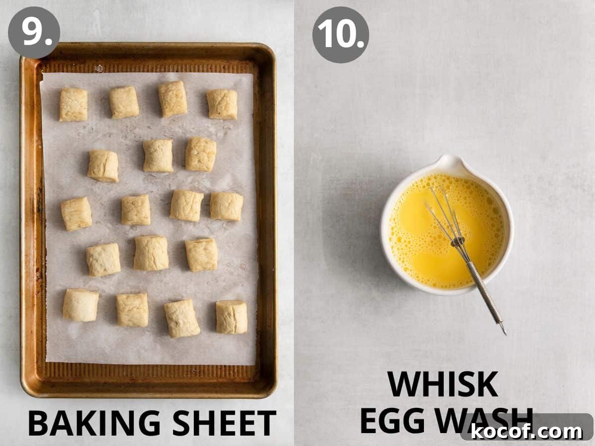 Boiled pretzel bites on a baking tray, and egg wash in a bowl.