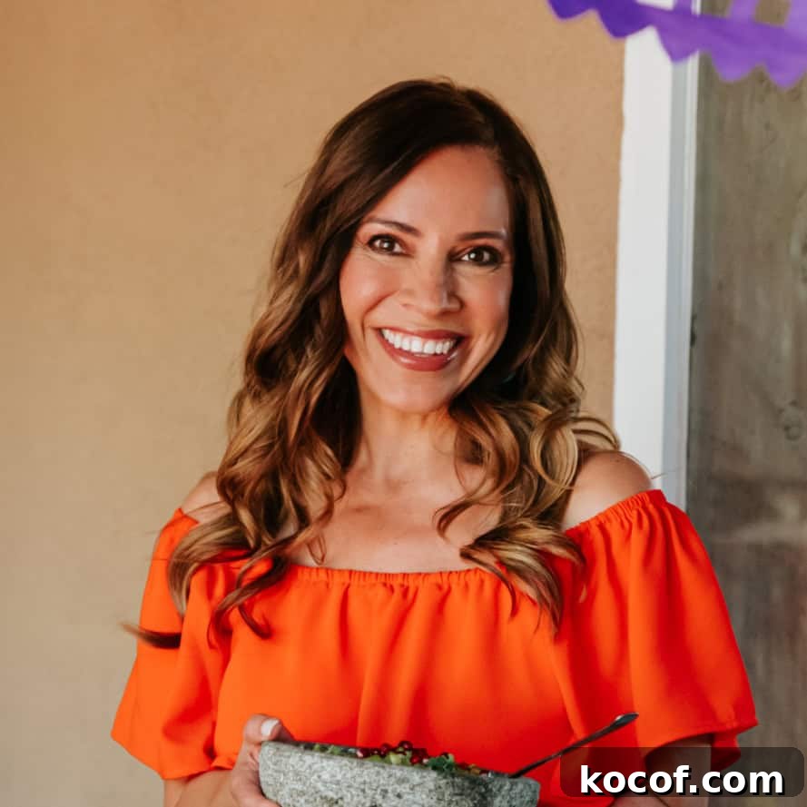 Smudge Your Home for Protection: Simple Ritual and Prayer 4 Yvette Marquez-Sharpnack, Mexican cookbook author and founder of Muy Bueno, holding a molcajete and sharing authentic, family-tested Mexican recipes rooted in tradition.