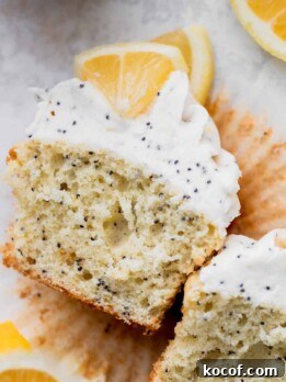 Lemon Poppy Seed Cupcakes with Zesty Glaze and Moist Crumb 11 Lemon poppy seed cupcakes split in half.