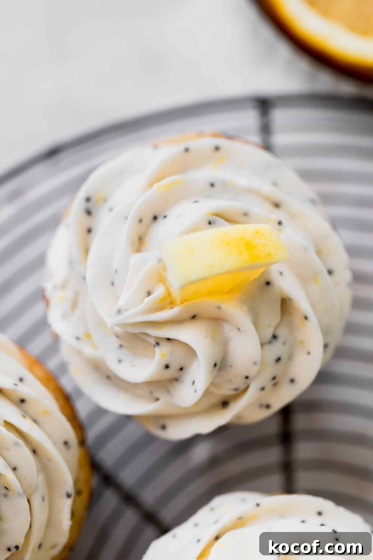 Lemon Poppy Seed Cupcakes with Zesty Glaze and Moist Crumb 10 Top view of the cupcakes.
