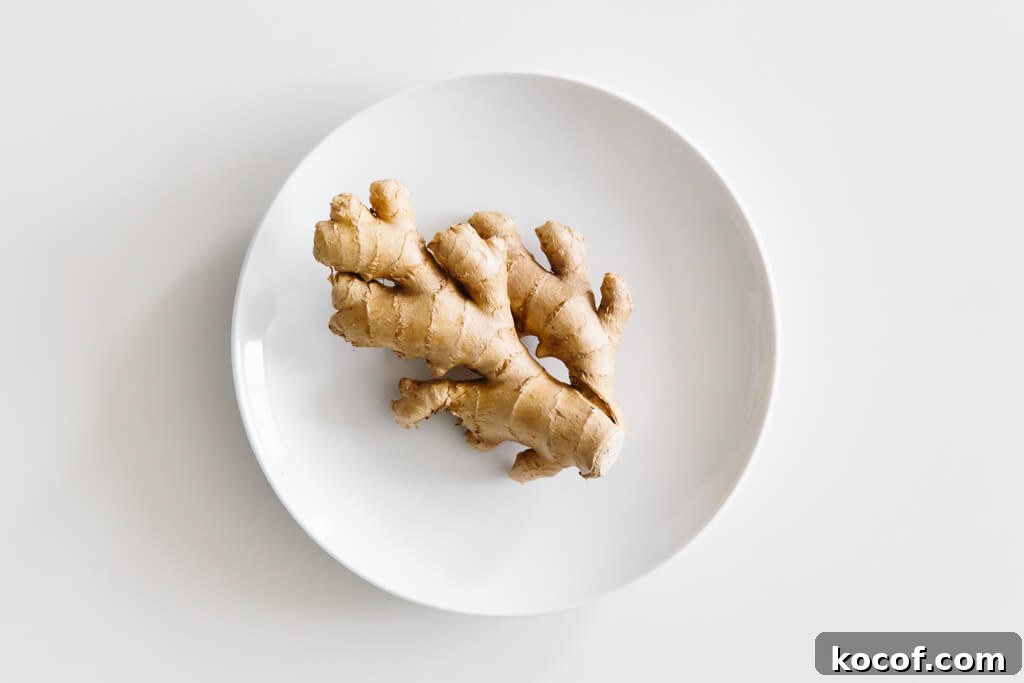 Plate of ginger on a white table.