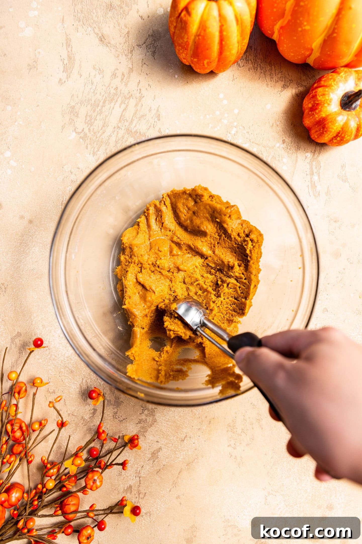 Brown Butter Pumpkin Snickerdoodle Cookies — Soft & Chewy 8 Cookie scoop portioning out snickerdoodle cookie dough.