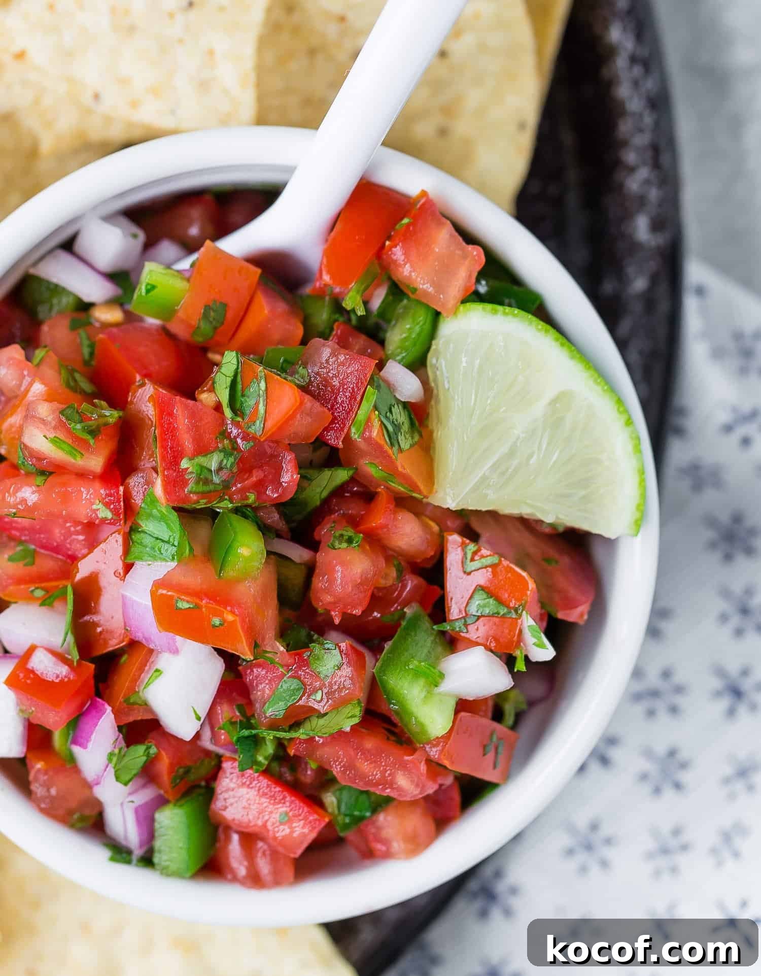 Pico de gallo in a white bowl.