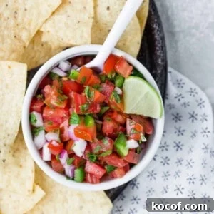 Pico de gallo in a white bowl.