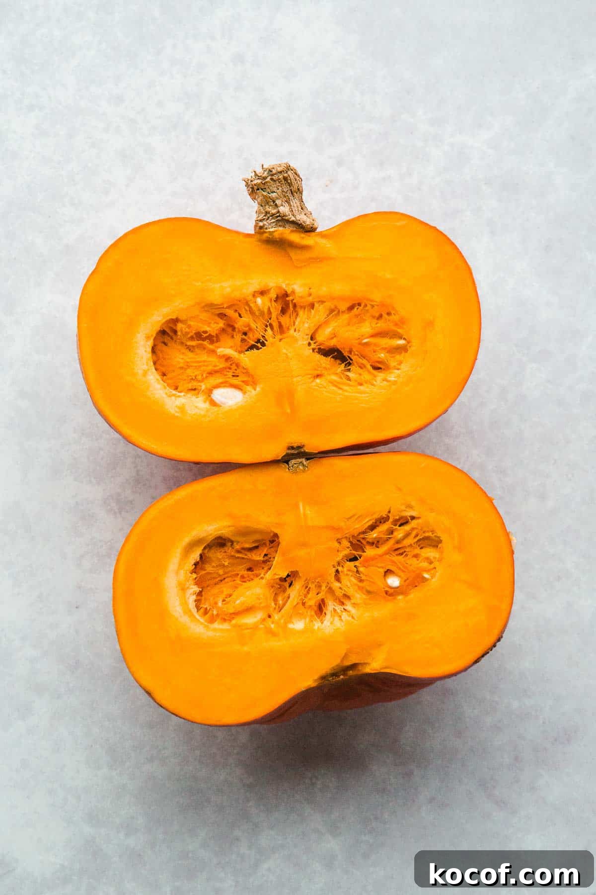 Creamy Autumn Pumpkin Soup Recipe for Cozy Dinners 4 A pumpkin cut into two halves