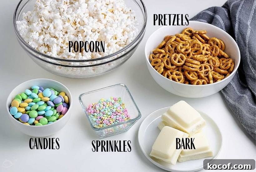 Bunny Bait Easter Snack Mix — No-Bake Party Treat 3 Bowls filled with ingredients for Easter snack mix on white counter with text overlay.