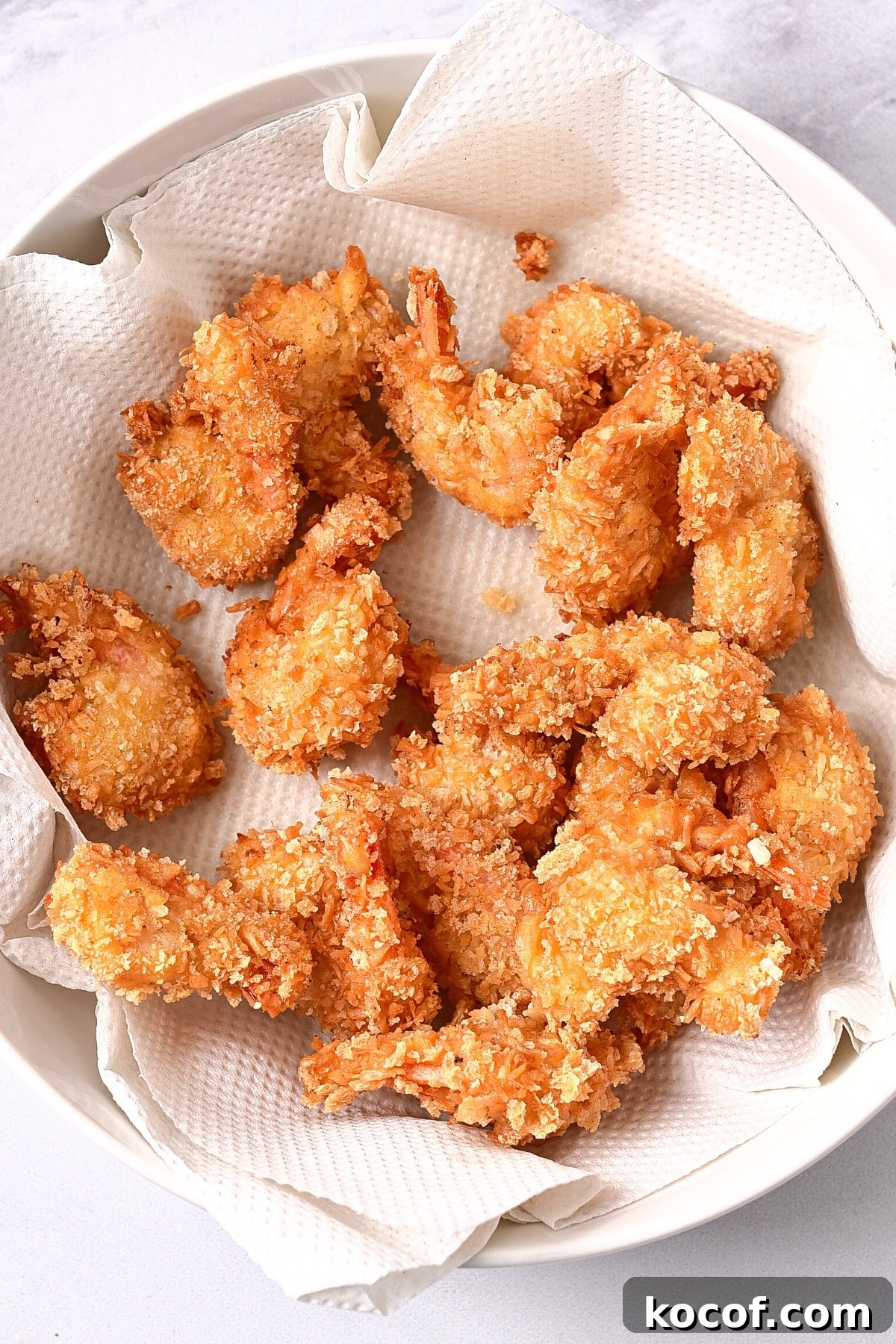 GF Coconut Shrimp (dairy-free) Freshly cooked crispy coconut shrimp (gluten-free).