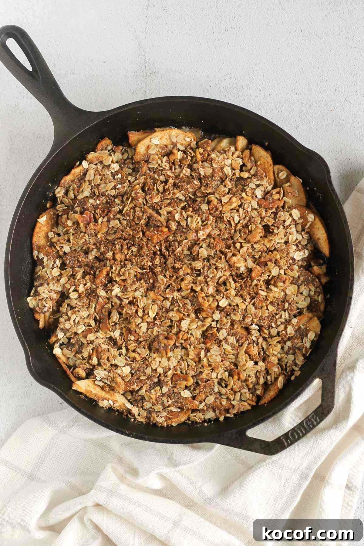 Apple crisp in a cast iron skillet after being baked.
