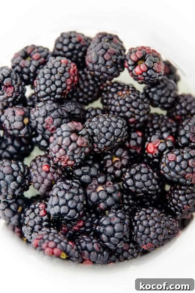 Blackberry Sangria with Blackberry Brandy: Simple Refreshing Recipe 2 pitcher filled with blackberries