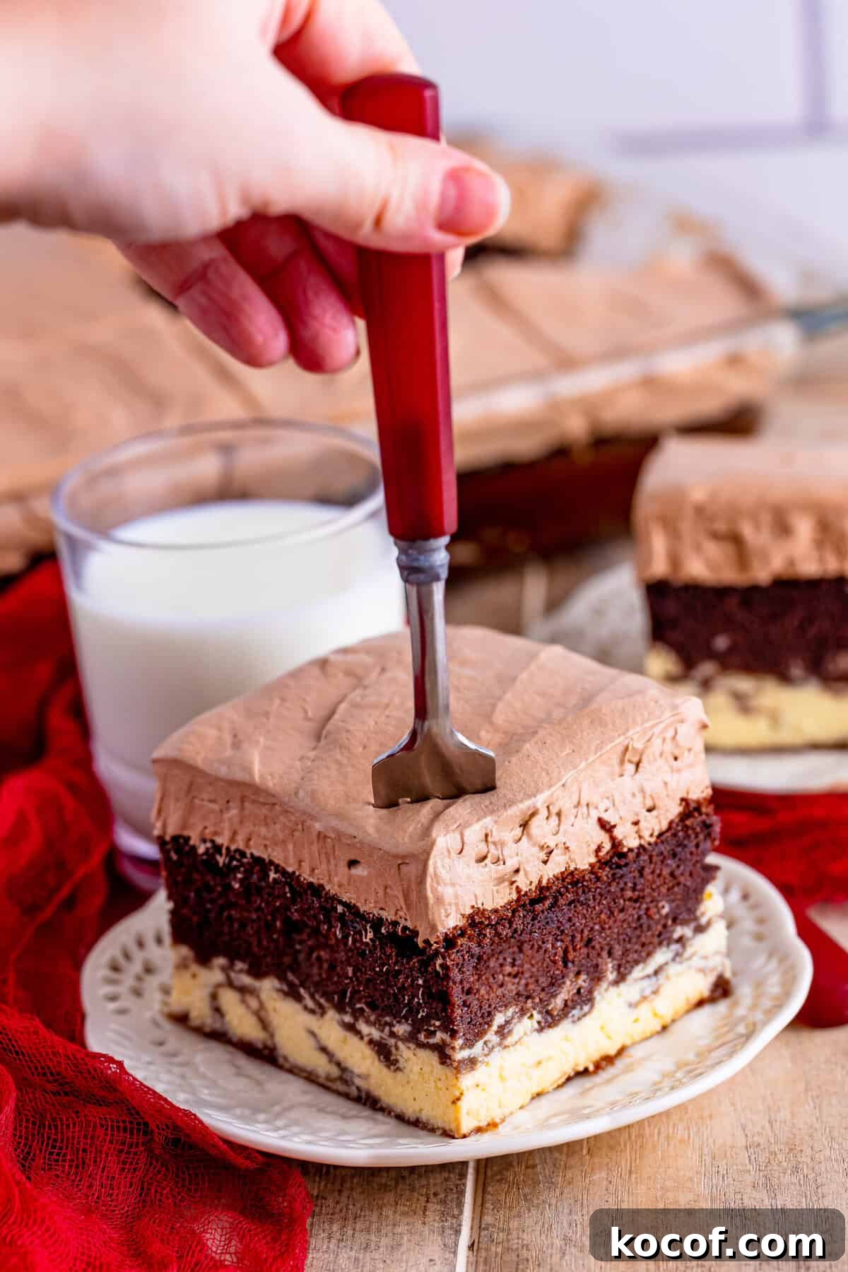Picture of a piece of the Italian Love cake with a fork in it.