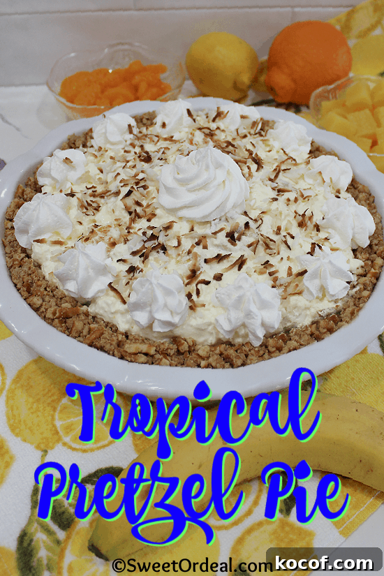 Tropical Pretzel Pie is ultra light with tropical fruit folded into the gelatin/whipped topping mix. Toasted coconut topping a pretzel crust pie.