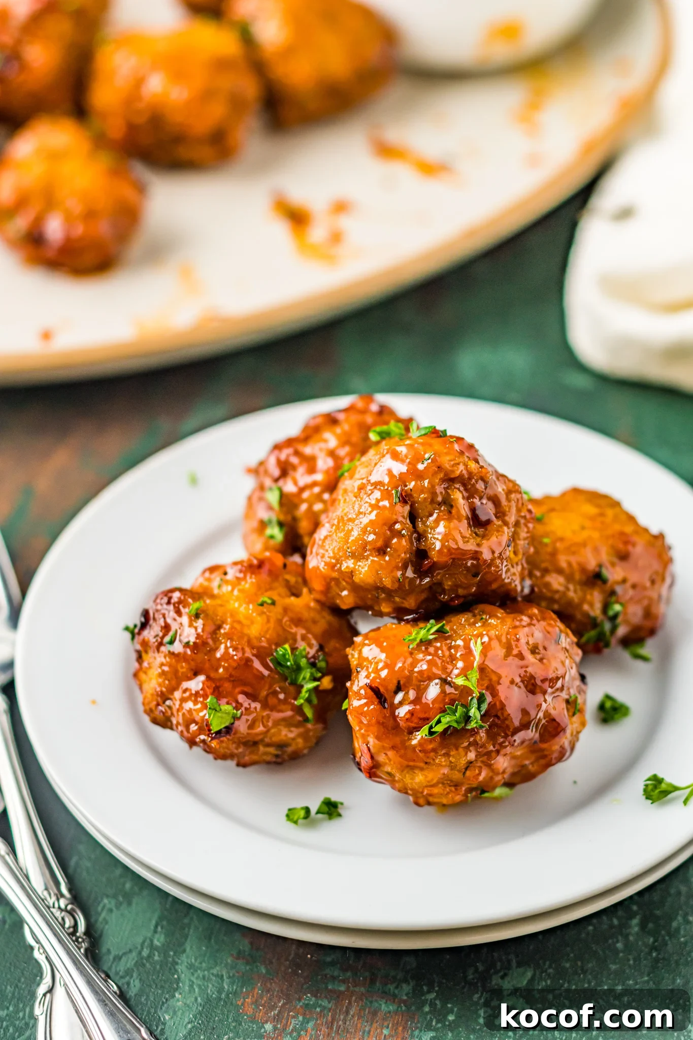 Crispy Air Fryer Meatballs Recipe for Quick Weeknight Meals 2 Air Fryer Meatballs on a plate.