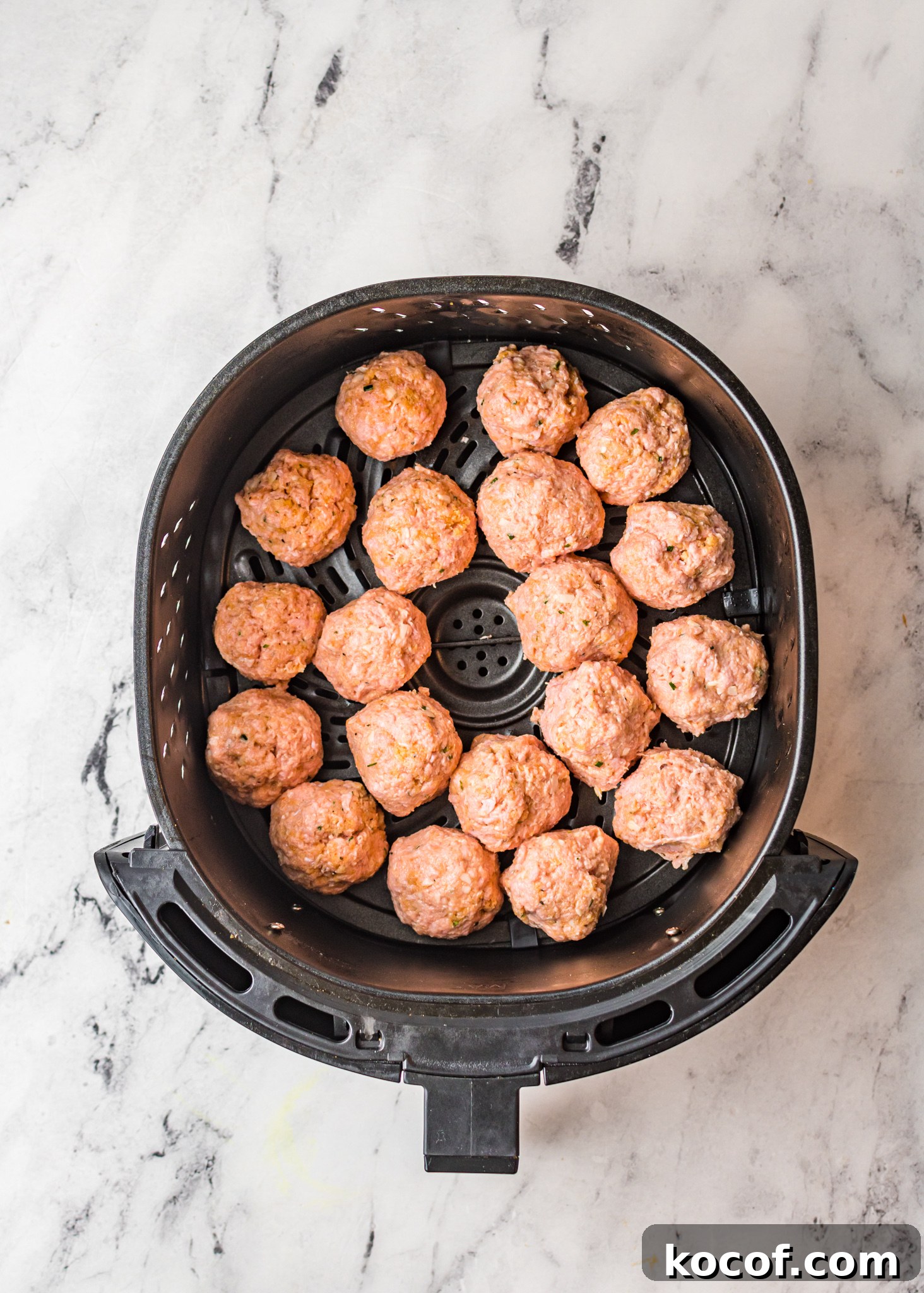 Crispy Air Fryer Meatballs Recipe for Quick Weeknight Meals 7 Air Fryer Meatballs in an air fryer.