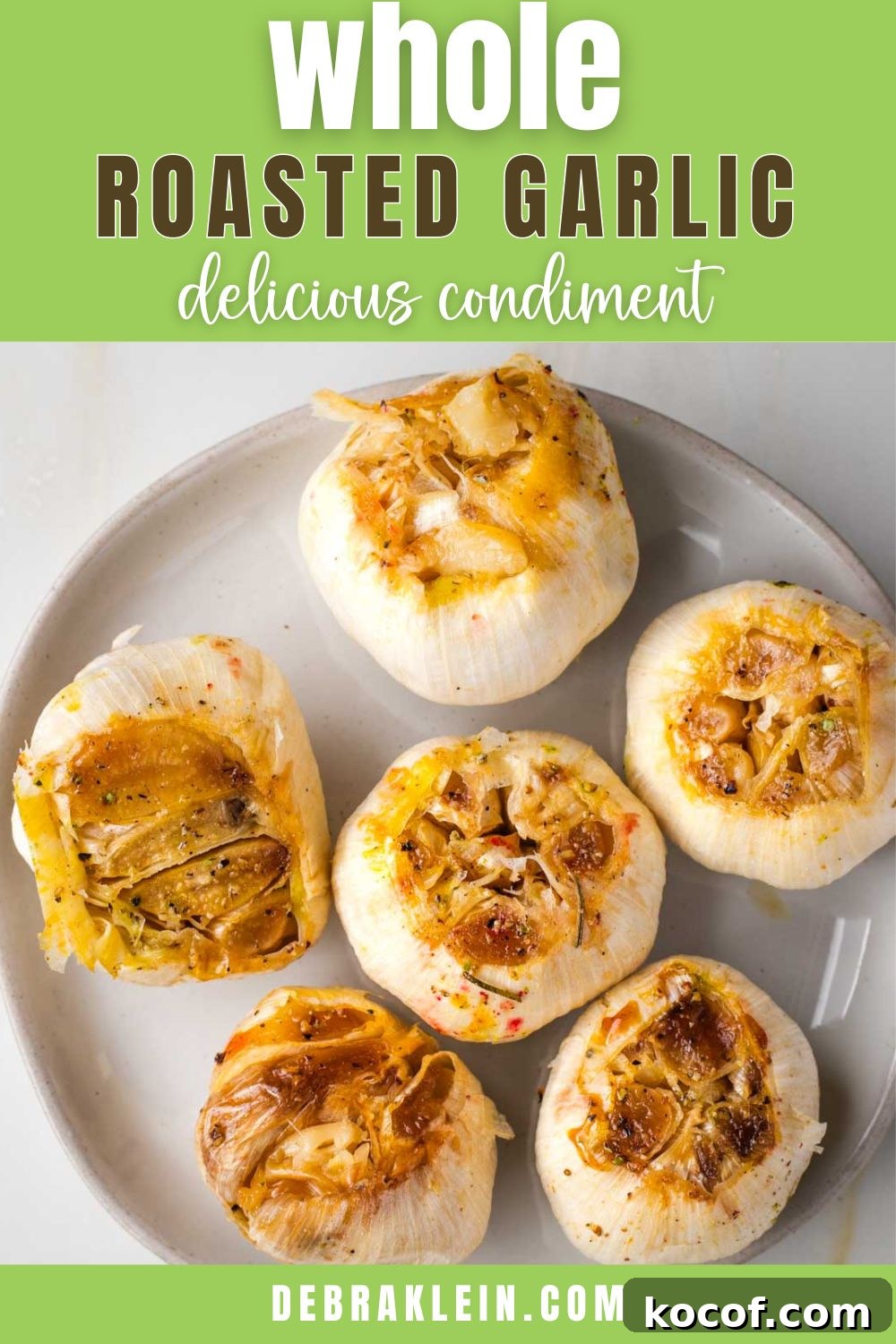 Oven-Roasted Garlic Bulbs: Crispy, Sweet Garlic Recipe 13 Plate full of roasted heads of garlic with the words "whole roasted garlic" written across the top.