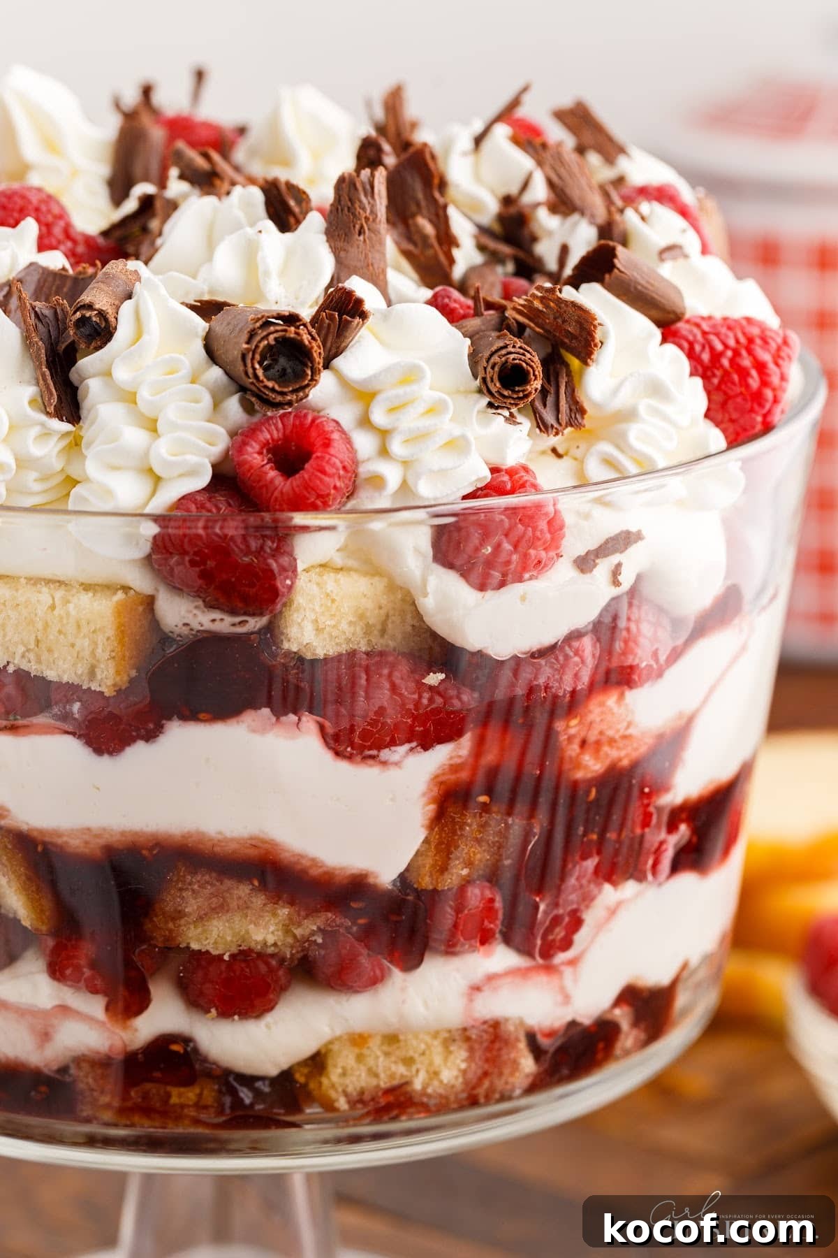 Decadent Raspberry Trifle Recipe with Layers of Cream and Cake 13 Right side close up of Raspberry Trifle.