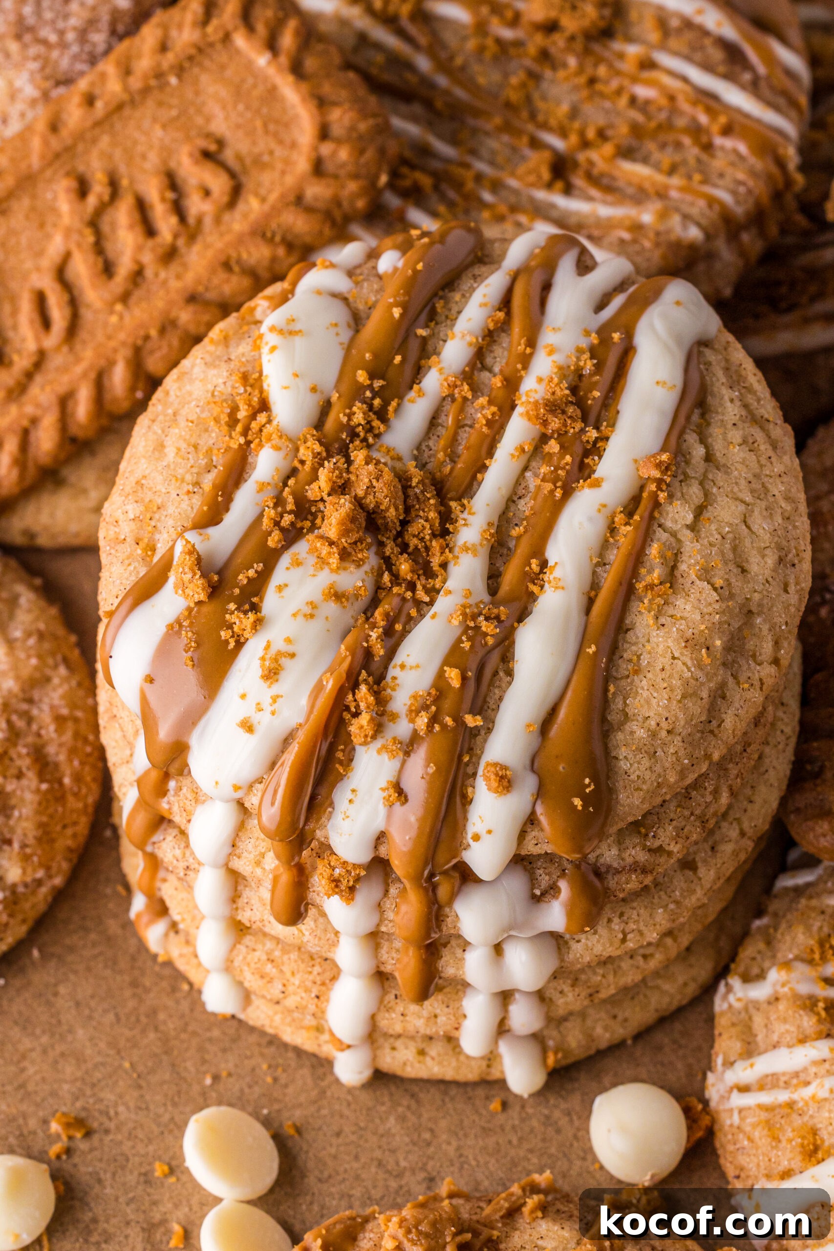 Biscoff Snickerdoodle Cookies drizzled with white chocolate and melted biscoff 