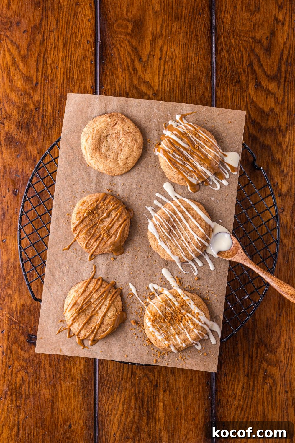 Biscoff Snickerdoodle Cookies drizzled with cookie butter and white chocolate on top of each cookies
