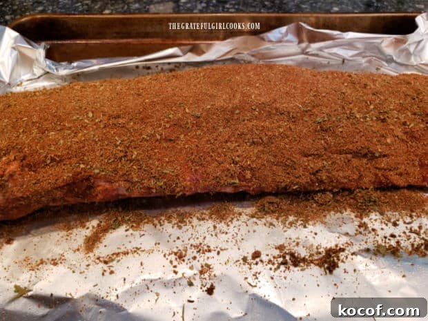 Baked Grilled Baby Back Ribs - The Grateful Girl Cooks! The meaty side of the rib rack is covered fully with dry rub seasonings.