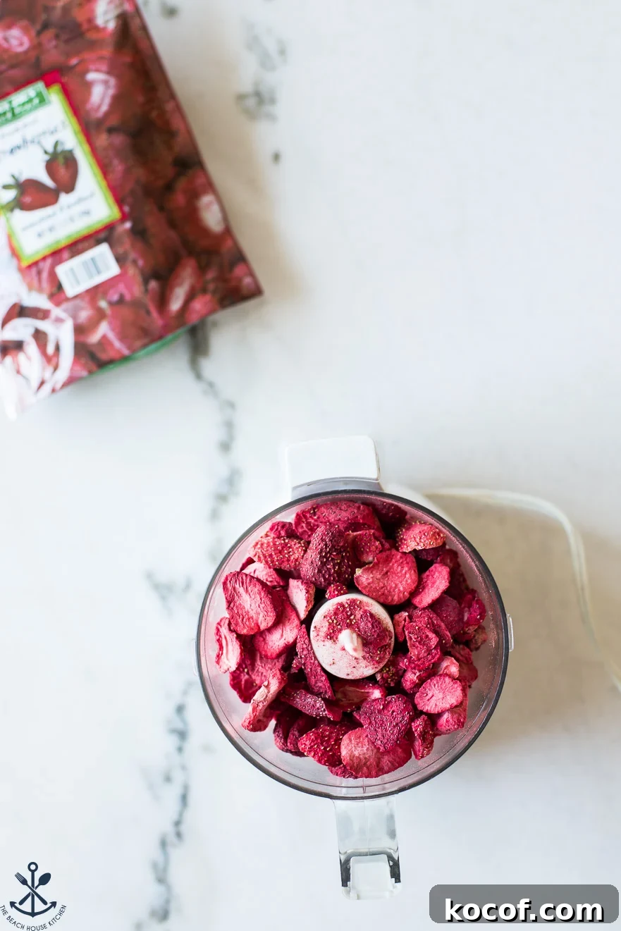 Strawberry Lemon Sugar Cookies Recipe with Fresh Fruit Zest 6 Overhead photo of a mini food processor filled with freeze-dried strawberries