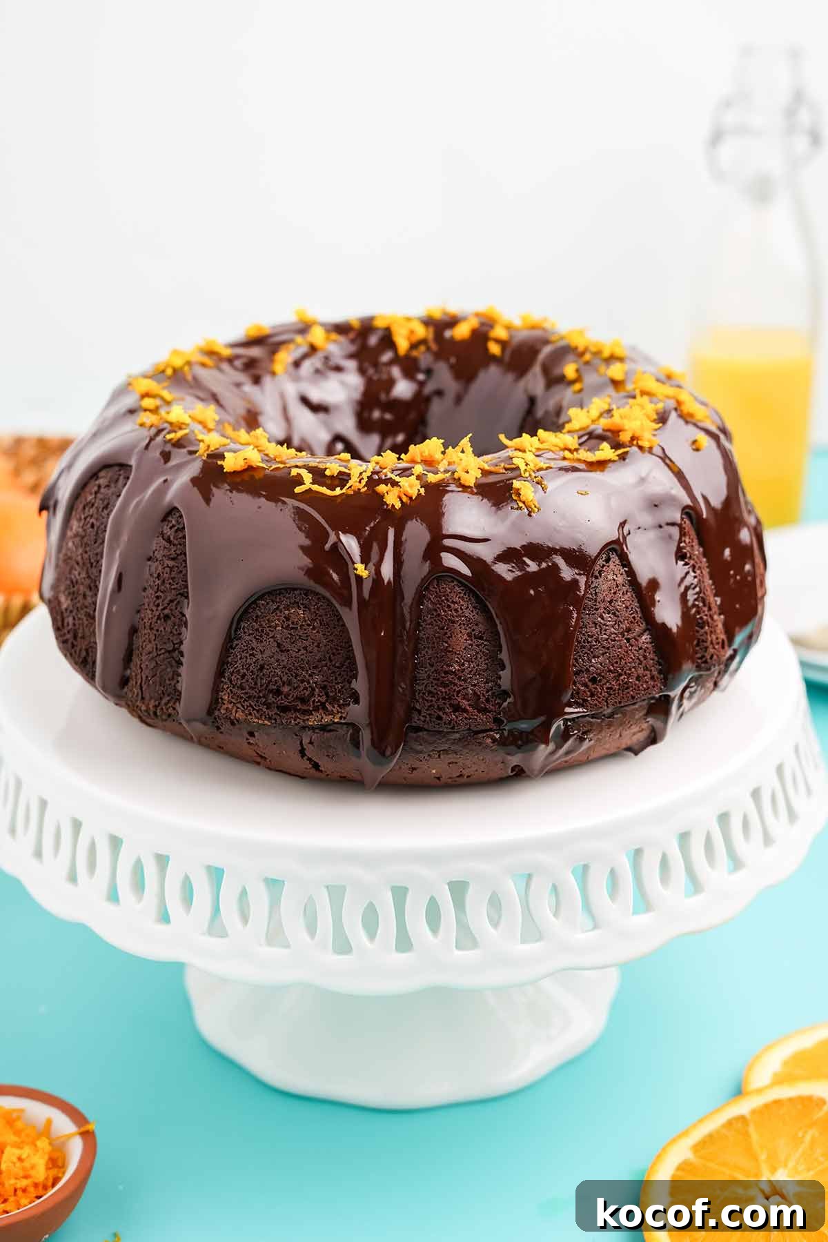 Chocolate orange bundt cake on a pedestal.