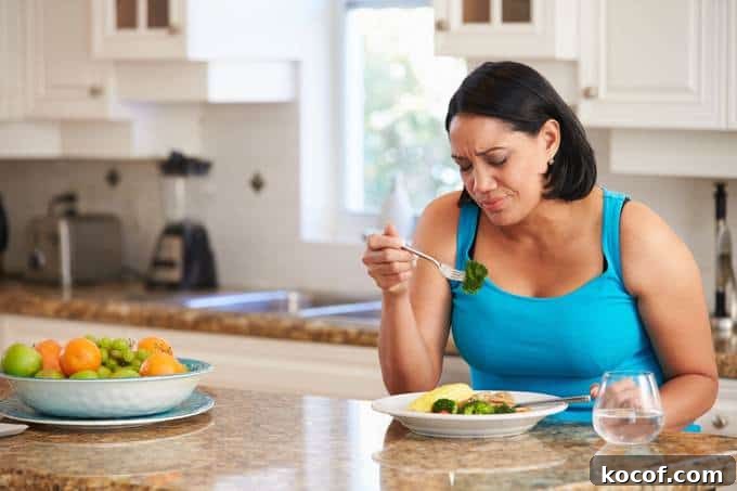 Woman in Kitchen Fed Up with Diet