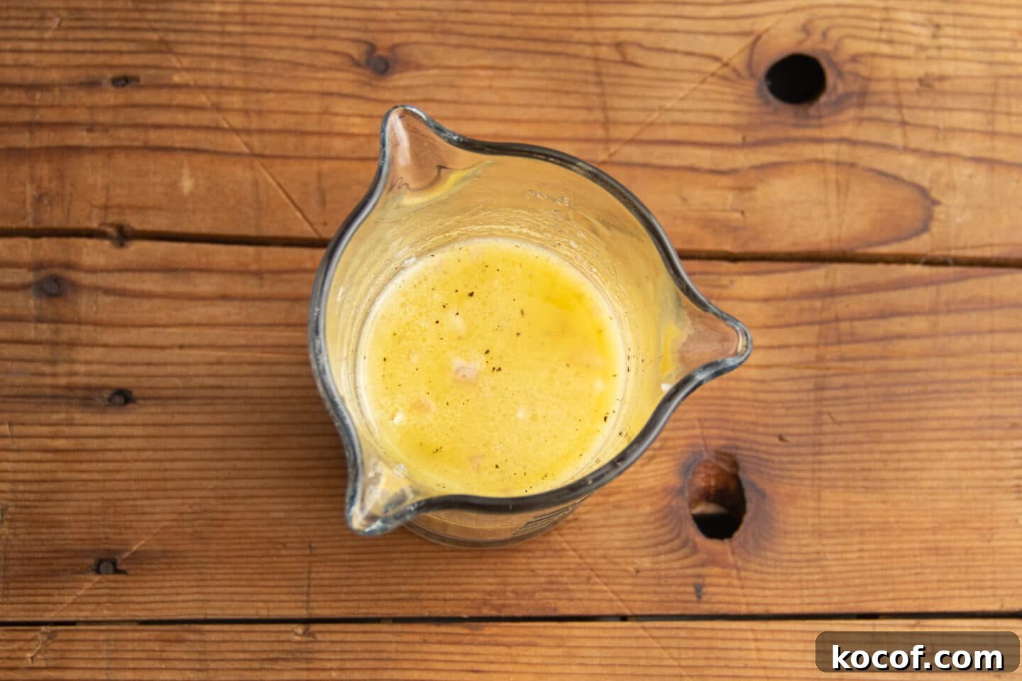 This is a picture of a cup with the shallot vinaigrette.