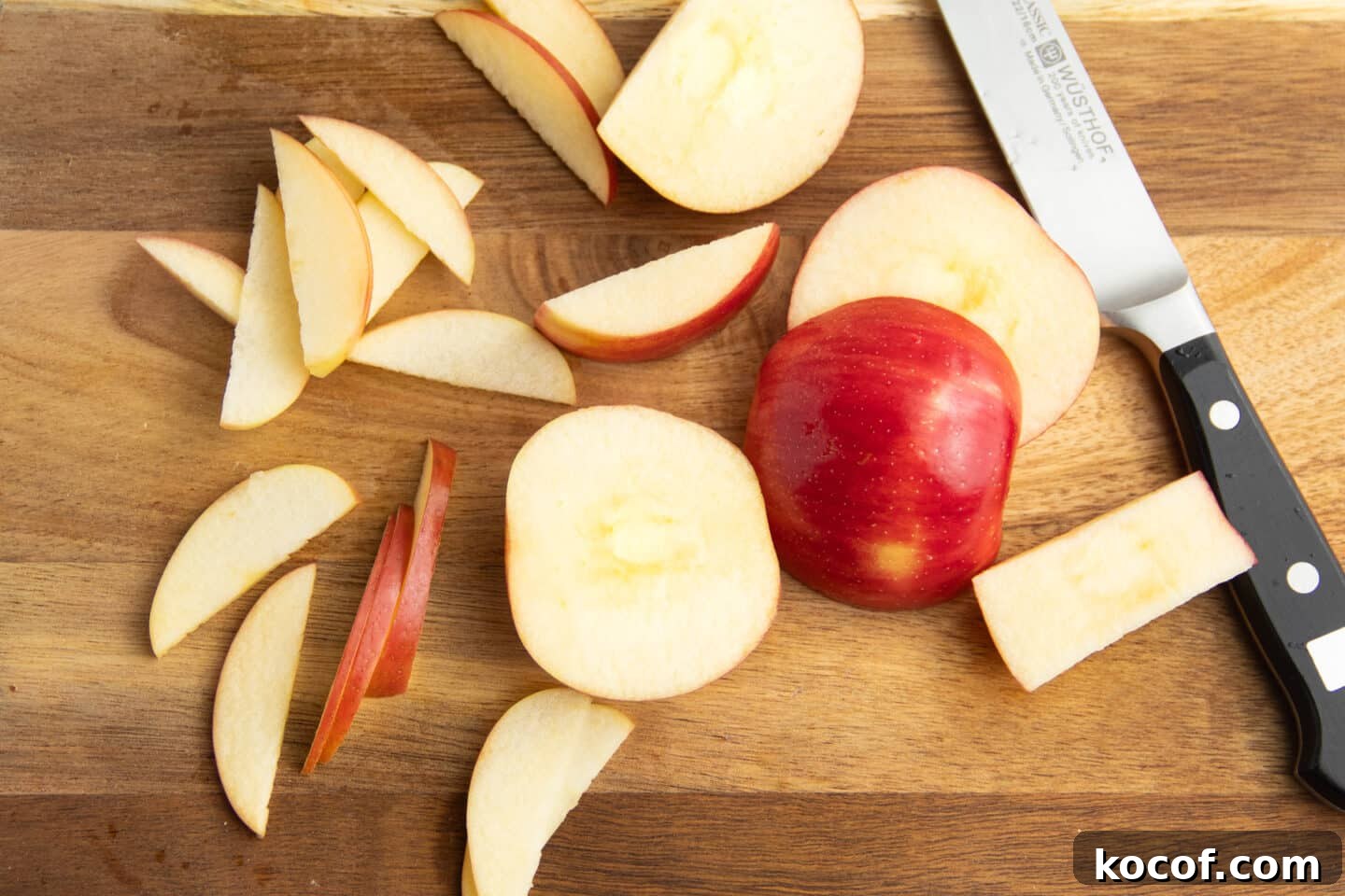 This is a picture of apples being sliced.