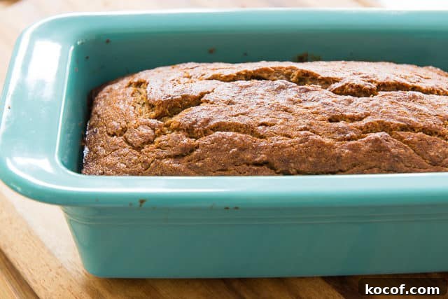 Banana Bread Fully Baked and Shown in Blue Loaf Pan