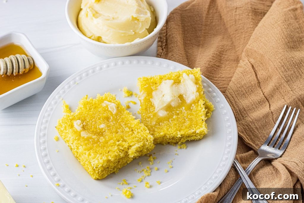 melted butter on cornbread on a white plate