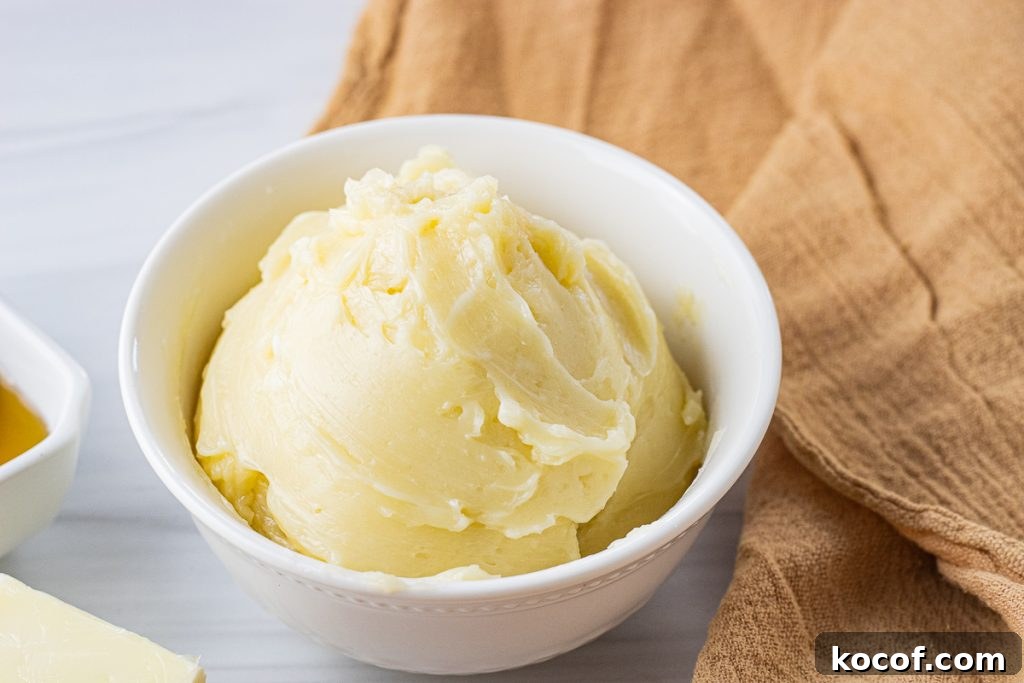 rounded scoop of honey butter in a small white bowl