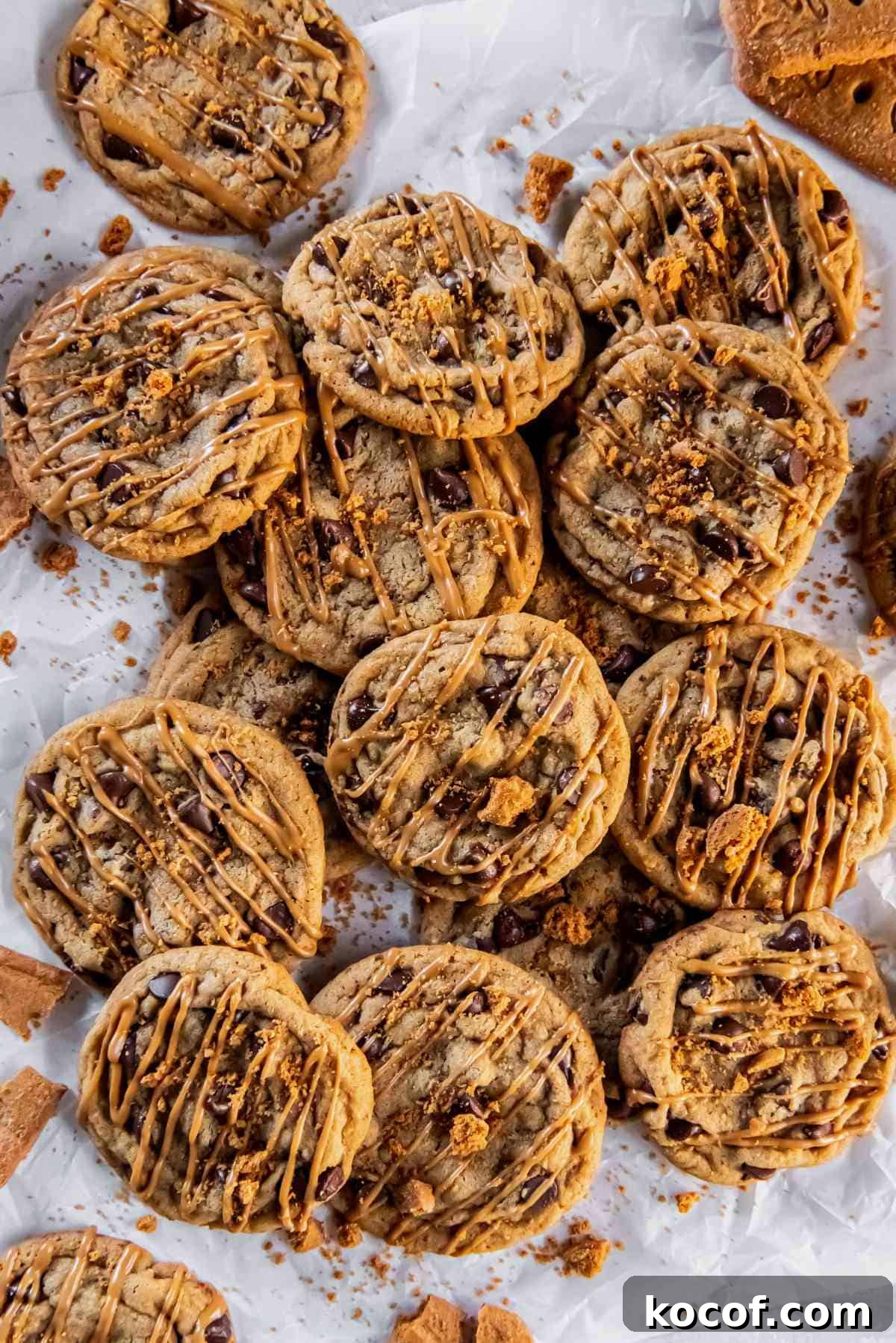 Chocolate Chip Cookie Butter Cookies Recipe for Crispy, Gooey Treats 3 tray of warm chocolate chip cookie butter cookies cooling on parchment paper.