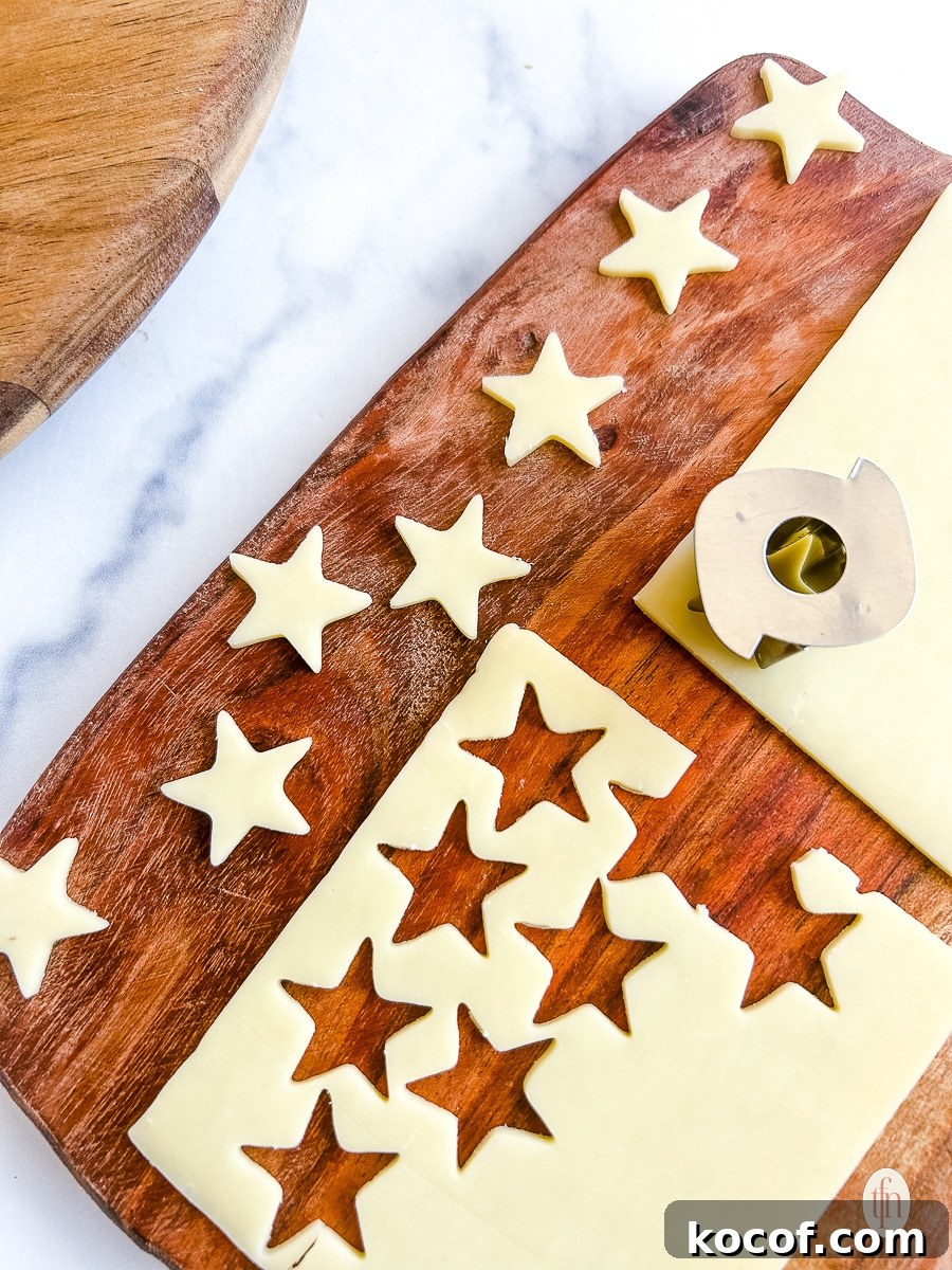Cut out stars on a cutting board.