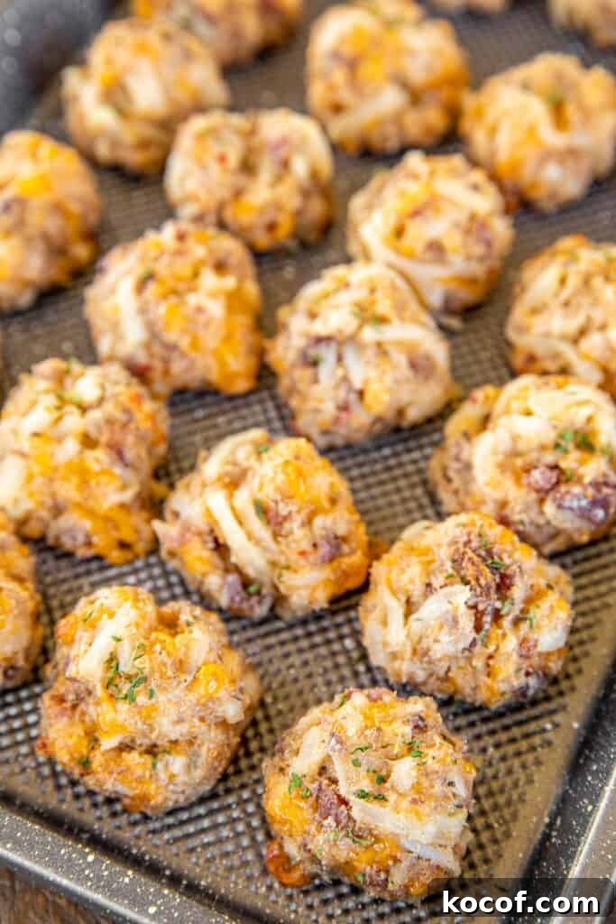 Sausage Hash Brown Balls with Cracked-Pepper Crust 3 baking sheet of baked sausage balls