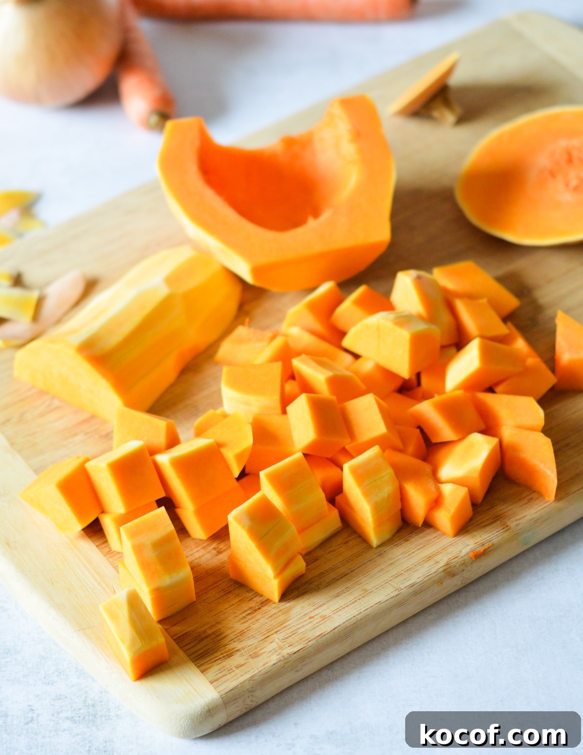 diced butternut squash on a cutting board. 